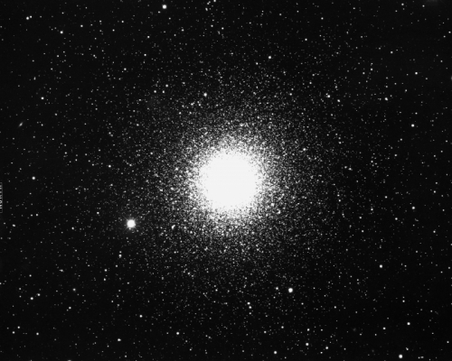 Telescopic image of globular cluster M15 explained in caption and text